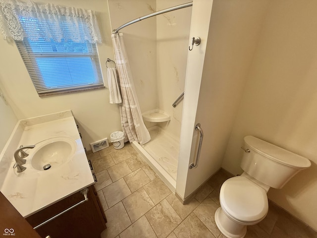 605 Redding Rd, Seymour, IN 47274 - full bath with vanity, a shower stall, and stone tile floors