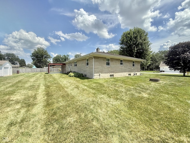 605 Redding Rd, Seymour, IN 47274 - rear view of property with stone siding and a chimney