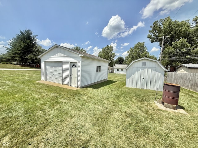 605 Redding Rd, Seymour, IN 47274 - view of yard with an outdoor structure and a detached garage