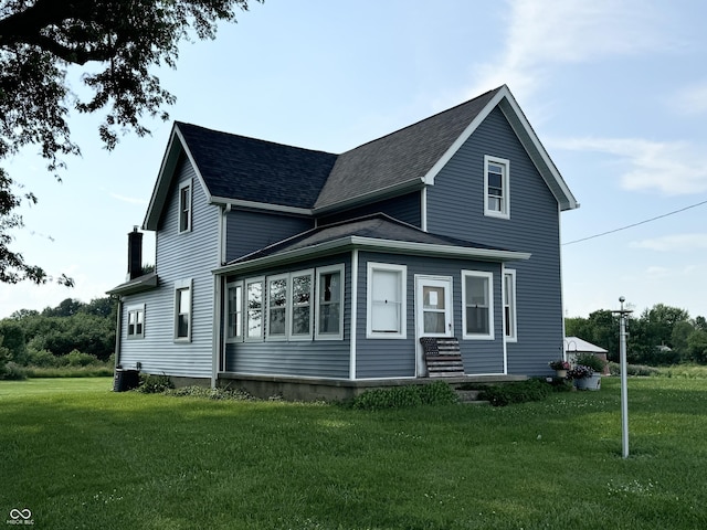 9721 S 100 E, Pendleton, IN 46064 - view of property exterior with a yard and roof with shingles