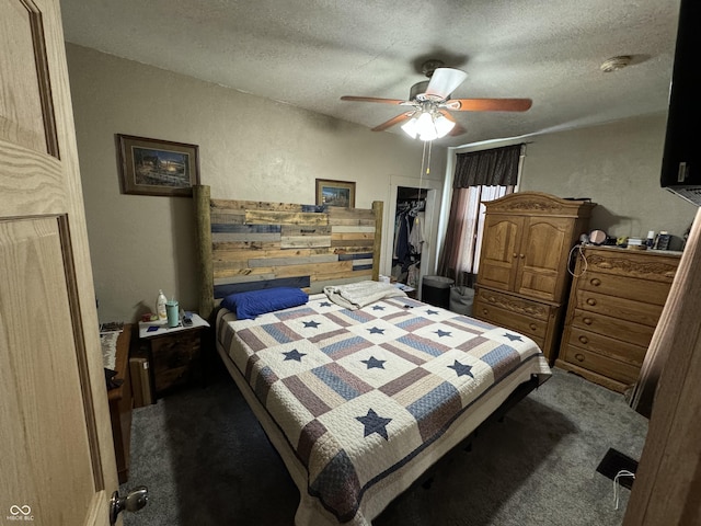 9721 S 100 E, Pendleton, IN 46064 - bedroom with carpet floors, a textured ceiling, a ceiling fan, and a closet