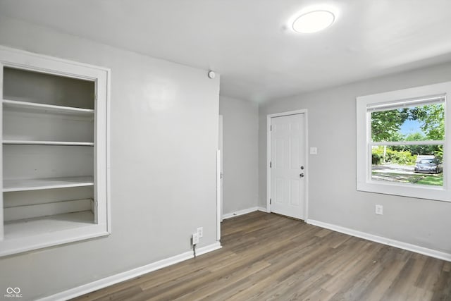 3609 N Keystone Ave, Indianapolis, IN 46218 - spare room featuring wood finished floors and baseboards
