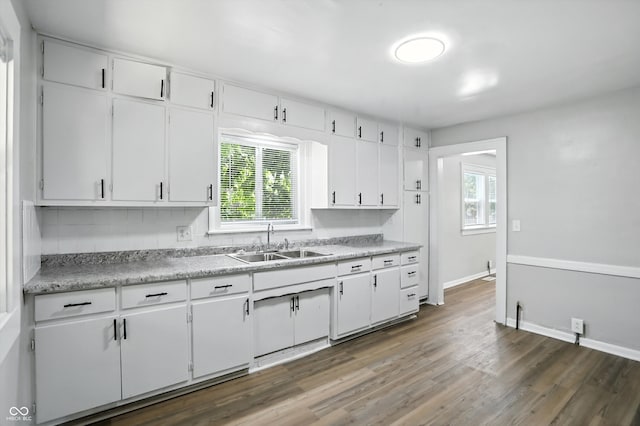3609 N Keystone Ave, Indianapolis, IN 46218 - kitchen featuring healthy amount of natural light, white cabinets, and wood finished floors