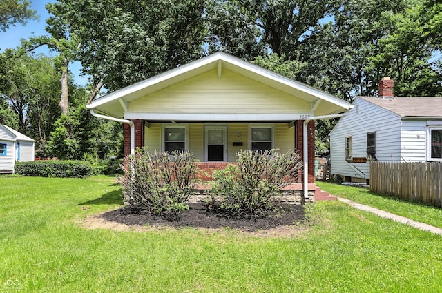 3609 N Keystone Ave, Indianapolis, IN 46218 - view of front of home with covered porch and brick siding