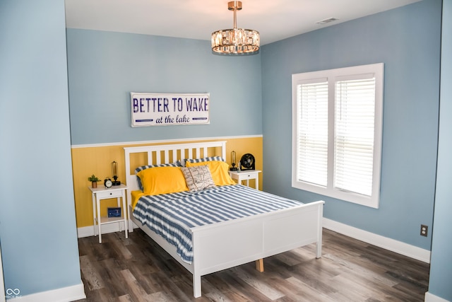 206 Olive St, Arcadia, IN 46030 - bedroom featuring a chandelier and wood finished floors