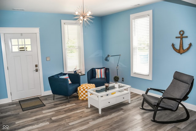 206 Olive St, Arcadia, IN 46030 - living room with wood finished floors and plenty of natural light