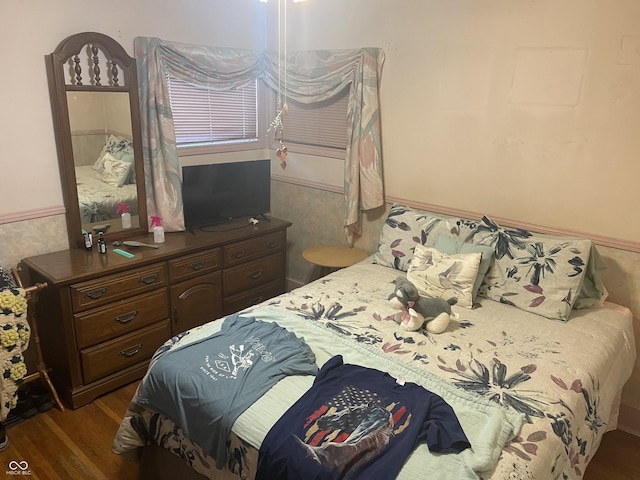 100 Durbin St, North Vernon, IN 47265 - bedroom with dark wood-style flooring