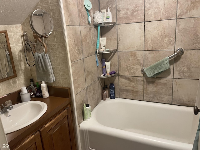 100 Durbin St, North Vernon, IN 47265 - bathroom with tile walls, vanity, and shower / tub combination