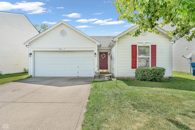 1912 Blue Pine Ln, Indianapolis, IN 46231 - view of front of house featuring concrete driveway, a garage, and a front lawn