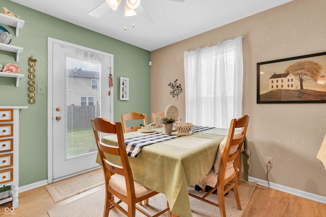 1912 Blue Pine Ln, Indianapolis, IN 46231 - dining area with plenty of natural light, ceiling fan, and light wood finished floors