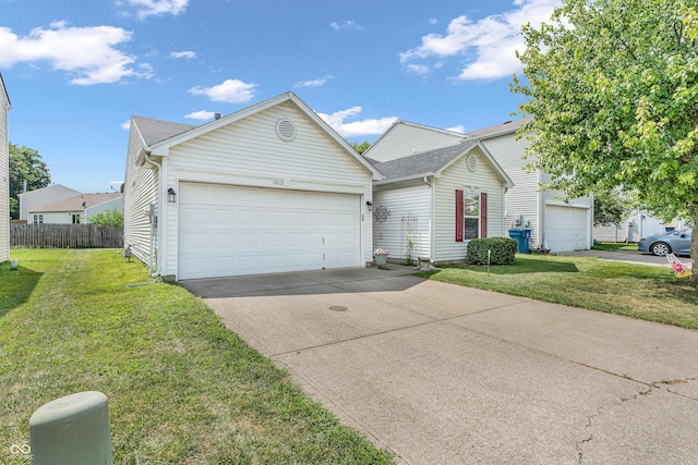 1912 Blue Pine Ln, Indianapolis, IN 46231 - traditional-style home with driveway, an attached garage, and roof with shingles