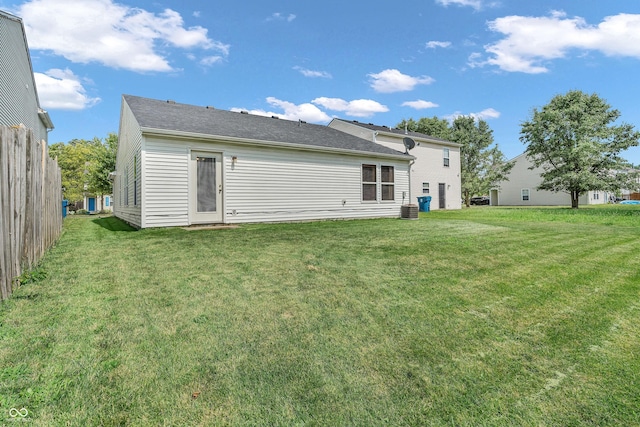 1912 Blue Pine Ln, Indianapolis, IN 46231 - rear view of house featuring a lawn