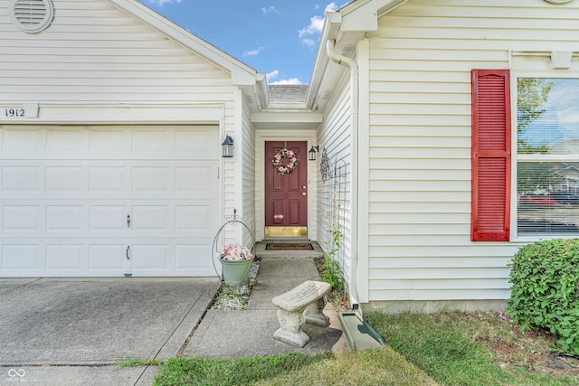 1912 Blue Pine Ln, Indianapolis, IN 46231 - doorway to property featuring concrete driveway and an attached garage