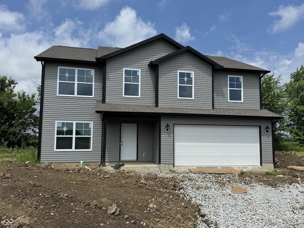 1035 Lake Ct, Shirley, IN 47384 - view of front of property with an attached garage and driveway