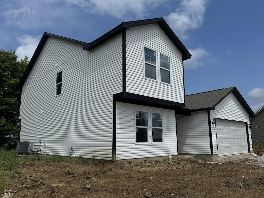 1123 Lake Dr, Shirley, IN 47384 - view of property exterior featuring driveway and a garage
