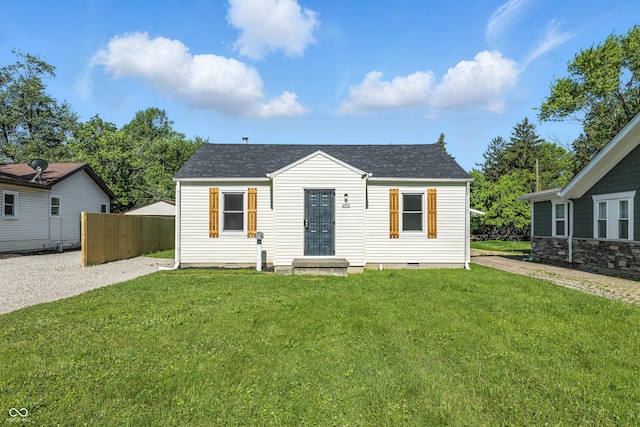 452 N Fenton Ave, Indianapolis, IN 46219 - view of front of home with a shingled roof and crawl space