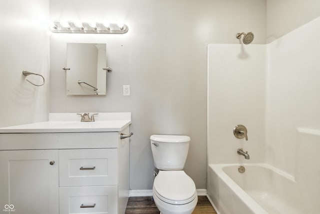 452 N Fenton Ave, Indianapolis, IN 46219 - bathroom featuring vanity, bathing tub / shower combination, and wood finished floors