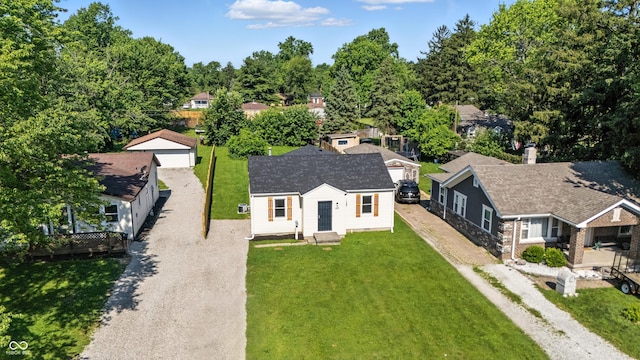 452 N Fenton Ave, Indianapolis, IN 46219 - view of front of home featuring driveway and a garage