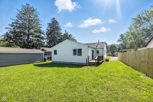 452 N Fenton Ave, Indianapolis, IN 46219 - rear view of house with a wooden deck