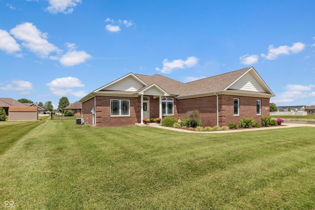 1976 Austin James Ln, Seymour, IN 47274 - ranch-style house with brick siding and a front yard