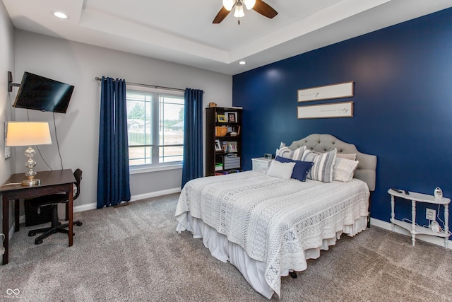 1976 Austin James Ln, Seymour, IN 47274 - carpeted bedroom with recessed lighting, a ceiling fan, and a raised ceiling