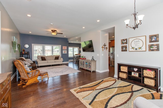 1976 Austin James Ln, Seymour, IN 47274 - living area featuring ceiling fan, a chandelier, dark wood-style floors, and recessed lighting
