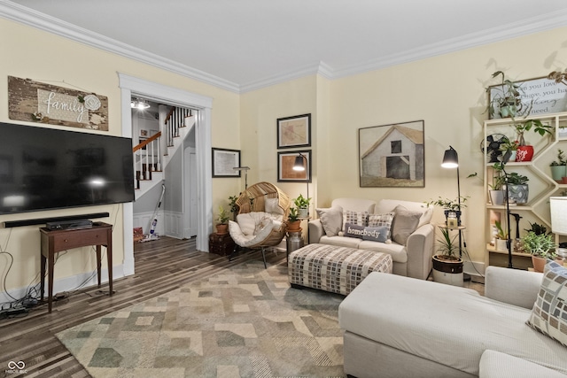38 W Main St, Brownsburg, IN 46112 - living room featuring crown molding, wood finished floors, and stairs