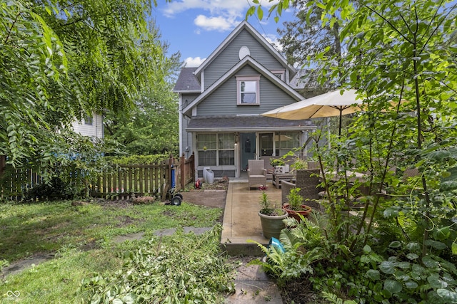 38 W Main St, Brownsburg, IN 46112 - back of house featuring a patio and roof with shingles