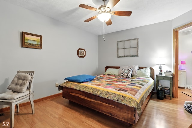 1346 N Buck Creek Rd, Greenfield, IN 46140 - bedroom featuring light wood-style flooring and a ceiling fan
