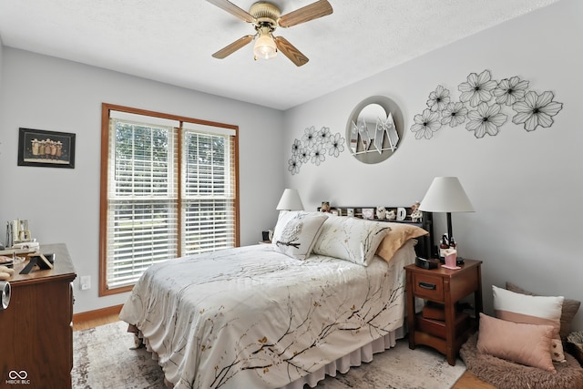 1346 N Buck Creek Rd, Greenfield, IN 46140 - bedroom featuring wood finished floors and a ceiling fan