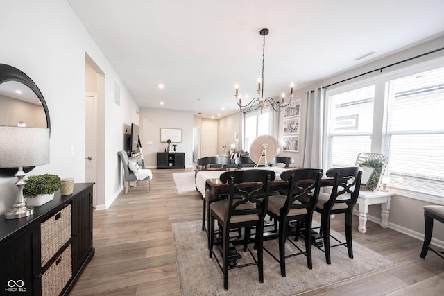2856 Old Rosebud Ln, Westfield, IN 46074 - dining room with a chandelier, light wood-style floors, and recessed lighting