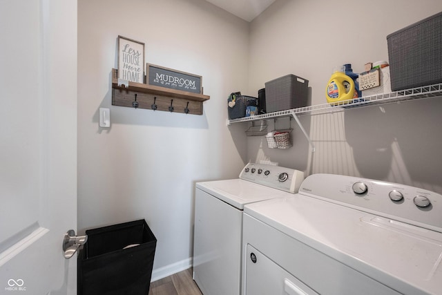 2856 Old Rosebud Ln, Westfield, IN 46074 - laundry room with separate washer and dryer and wood finished floors