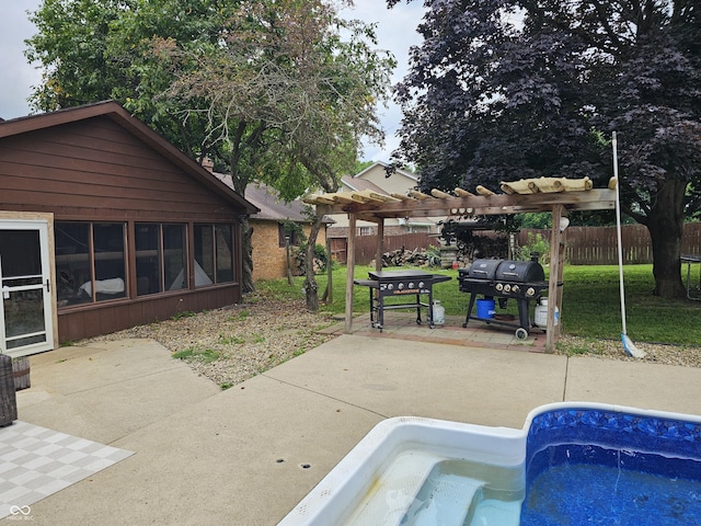 2239 Chevelle Ct, Anderson, IN 46012 - view of patio featuring a pergola, grilling area, and a sunroom