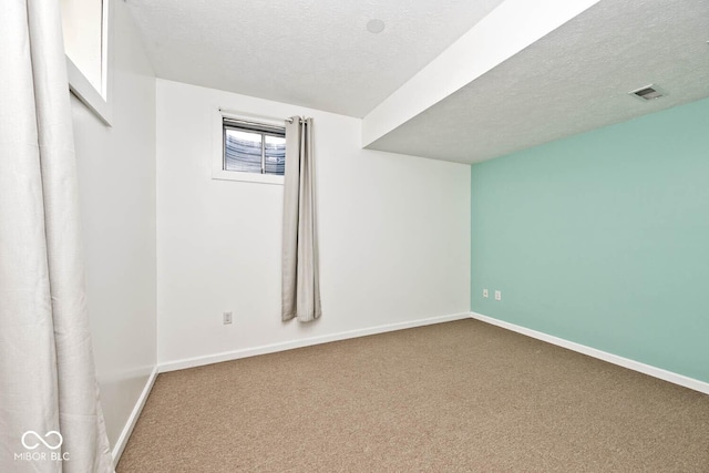 8909 Carnation Dr, Noblesville, IN 46060 - unfurnished room featuring a textured ceiling and carpet