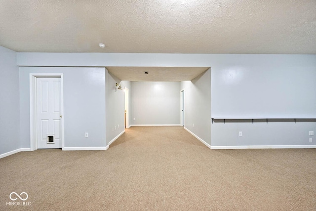 8909 Carnation Dr, Noblesville, IN 46060 - finished basement with carpet floors and a textured ceiling