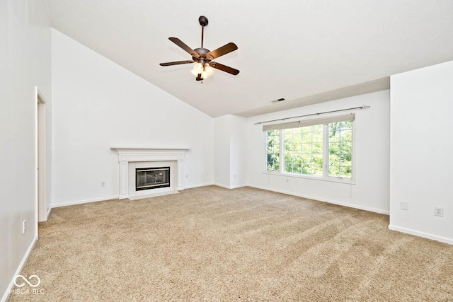 8909 Carnation Dr, Noblesville, IN 46060 - unfurnished living room featuring carpet flooring, a ceiling fan, a fireplace with flush hearth, and high vaulted ceiling