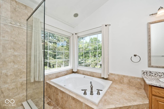 8909 Carnation Dr, Noblesville, IN 46060 - bathroom with a garden tub, vanity, vaulted ceiling, and a tile shower