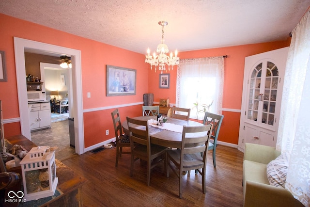 643 Harlan St, Plainfield, IN 46168 - dining area with wood finished floors and a chandelier