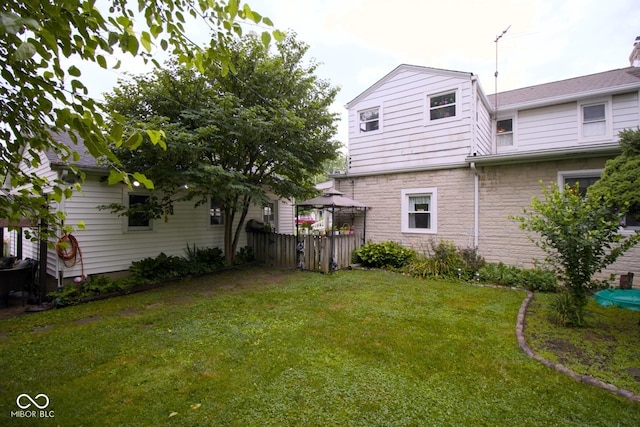 643 Harlan St, Plainfield, IN 46168 - view of grassy yard featuring a gazebo