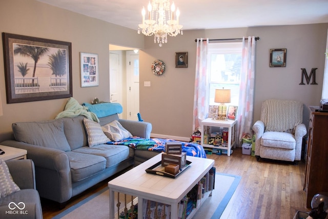 643 Harlan St, Plainfield, IN 46168 - living room with wood finished floors and a chandelier