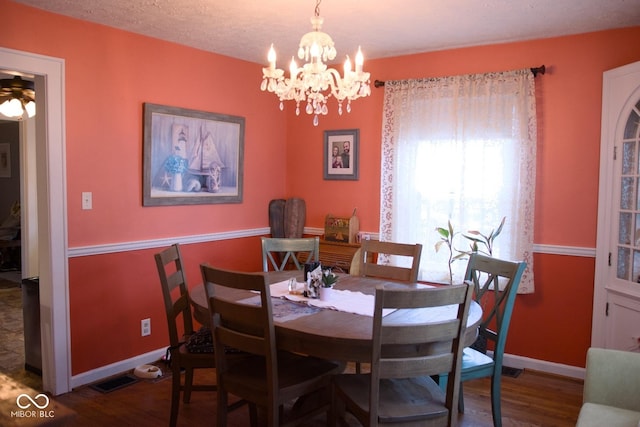643 Harlan St, Plainfield, IN 46168 - dining room featuring wood finished floors and a chandelier