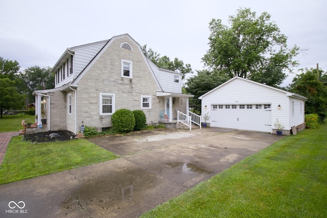 643 Harlan St, Plainfield, IN 46168 - colonial inspired home with stone siding, an outbuilding, a detached garage, and a front lawn