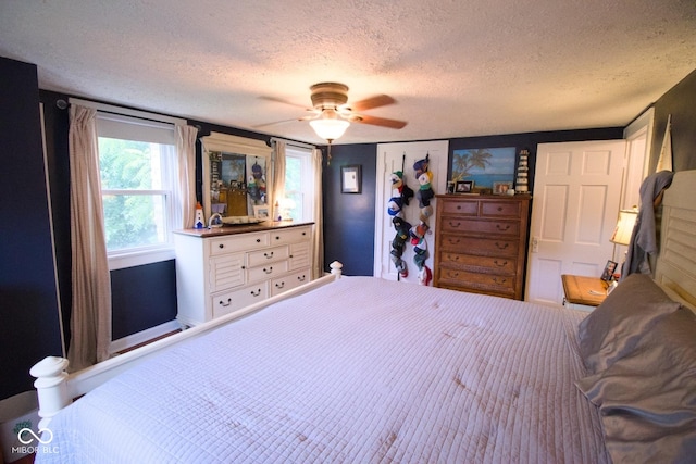 643 Harlan St, Plainfield, IN 46168 - bedroom with a textured ceiling and a ceiling fan