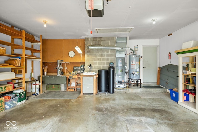 3620 Winter St, Lafayette, IN 47909 - garage with a garage door opener, water heater, and concrete block wall
