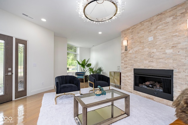 2130 Brookside Pkwy N Drive, Indianapolis, IN 46201 - living area with wood finished floors, a fireplace, and recessed lighting