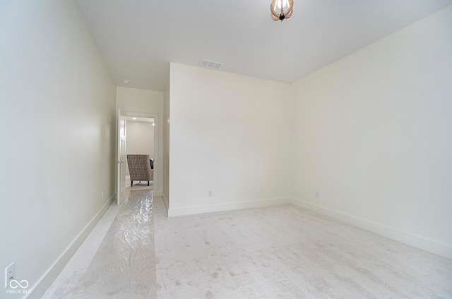 2130 Brookside Pkwy N Drive, Indianapolis, IN 46201 - spare room featuring light carpet and baseboards