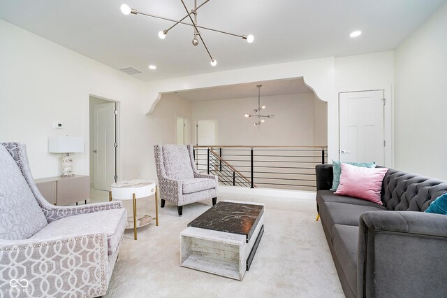 2130 Brookside Pkwy N Drive, Indianapolis, IN 46201 - carpeted living room featuring a chandelier and recessed lighting