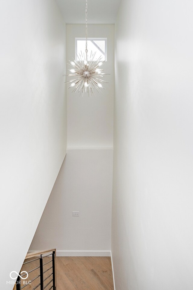 2130 Brookside Pkwy N Drive, Indianapolis, IN 46201 - stairway with a chandelier and wood finished floors
