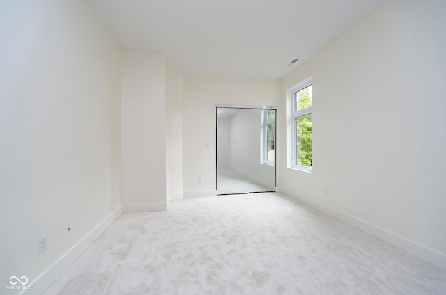 2130 Brookside Pkwy N Drive, Indianapolis, IN 46201 - unfurnished bedroom with carpet and a closet