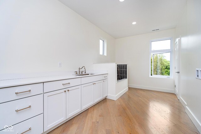 2130 Brookside Pkwy N Drive, Indianapolis, IN 46201 - bar featuring healthy amount of natural light, light wood-style flooring, and recessed lighting